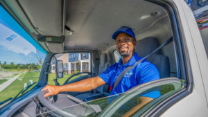 Picture of Top flight Owner, Charles Hosch in the Top Flight Junk Truck